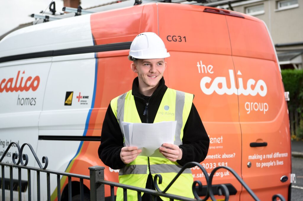 An apprentice tradesperson in uniform